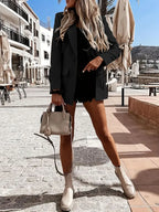 Veste blazer professionnelle col revers - vue latérale montrant la coupe impeccable et le style intemporel
