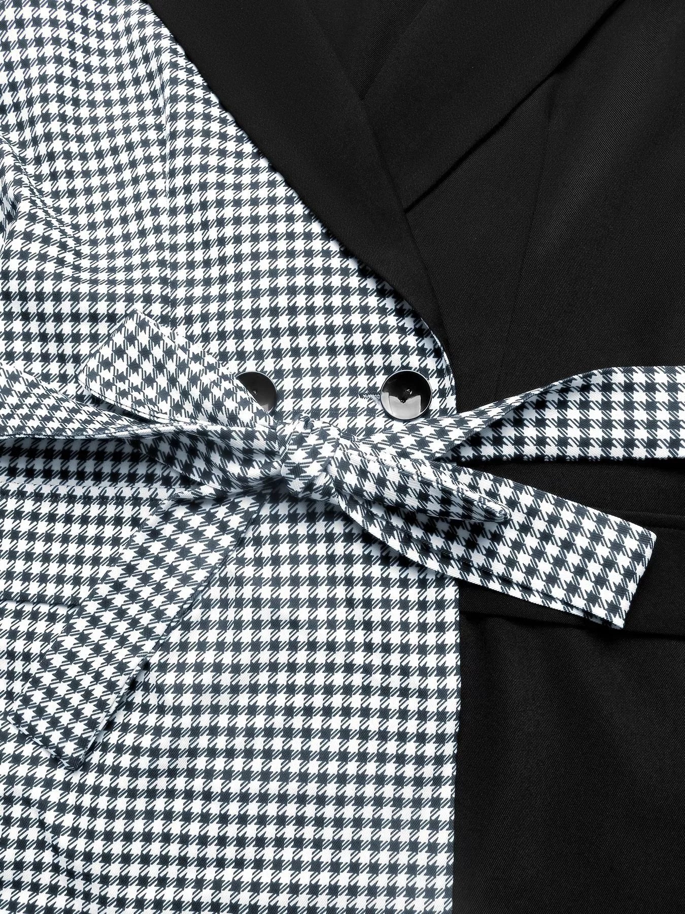 Blazer femme pied-de-poule ceinture nouée vue de prêt silhouette flatteuse élégante détail sur la ceinture rapprocher 
