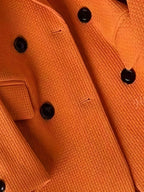 blazer double boutonnage texturé coupe sophistiquée professionnelle élégant de couleur Orange unique 
