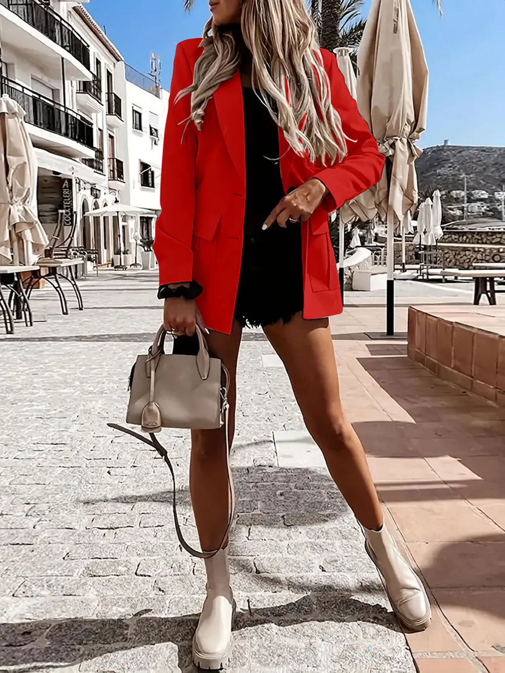 Veste blazer professionnelle col revers - vue de face montrant la coupe impeccable et le style intemporel
