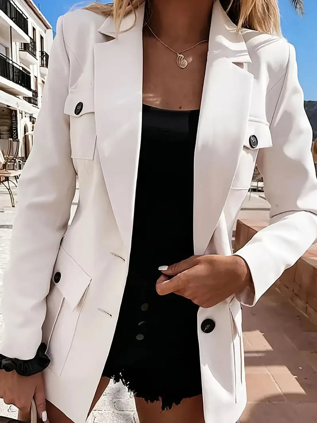 Blazer femme col revers manches longues - détail double boutonnage raffiné et finitions premium qualité
