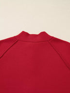  🌟 Vue arrière du cardigan enveloppant à col - Détail de la longueur élégante et de la tenue impeccable du vêtement