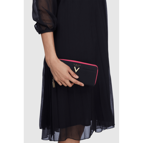 "Portefeuille vegan ouvert montrant compartiments cartes"