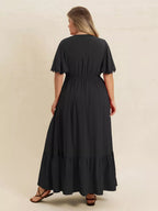  Détails dos de la Robe Maxi Boho à Volants Black-Coat noire grande taille - montrant les volants étagés et la longueur maxi élégante