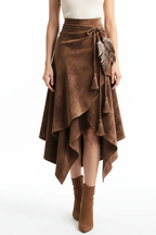 Jupe asymétrique pompons suédine plumes marron grande taille - vue de face montrant la coupe asymétrique moderne unique, pompons élégants décoratifs, ornements plumes, tissu suédine premium doux, esthétique bohème audacieuse - BLACK-COAT