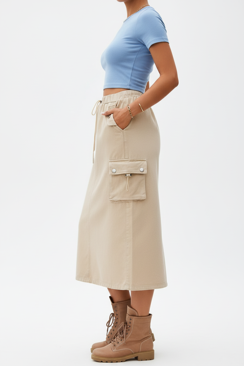 Jupe cargo beige mi-longue avec multiples poches latérales et cordon de serrage - vue de profil révélant les poches cargo fonctionnelles et la coupe droite - BLACK-COAT