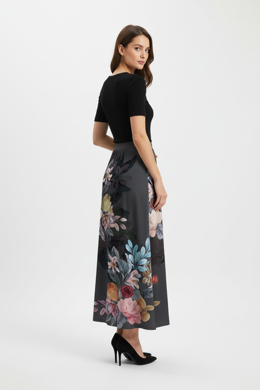 upe midi imprimée taille élastique noire avec motif floral artistique rose jaune bordeaux - vue arrière trois-quarts avec mannequin regardant par-dessus l'épaule montrant taille élastique tissu floral fluide et drapé élégant de la jupe midi - BLACK-COAT