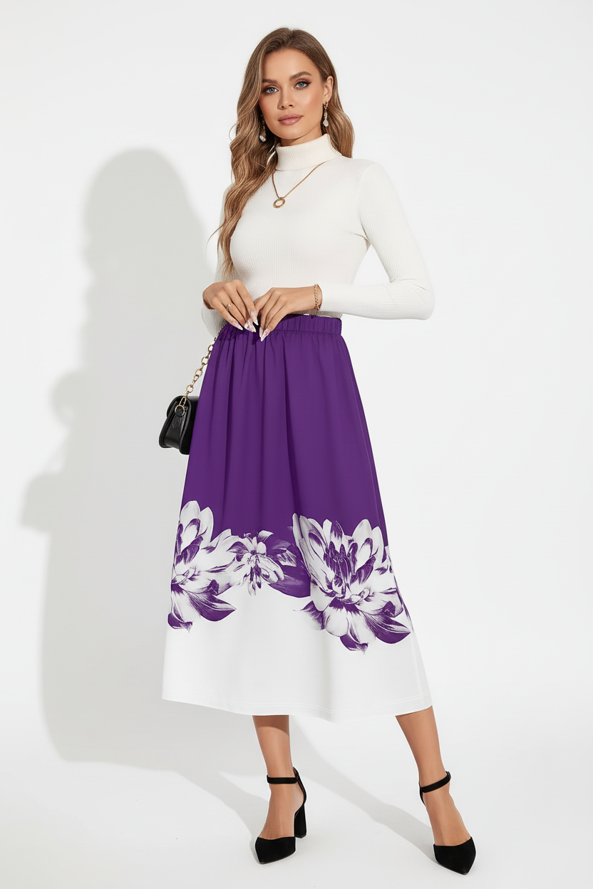 Jupe midi ligne A imprimé floral violette - vue de face complète avec jambe avant créant flux naturel du tissu montrant couleur violette vibrante motif floral blanc à l'ourlet silhouette A-line flatteuse et longueur midi intégrale - BLACK-COAT