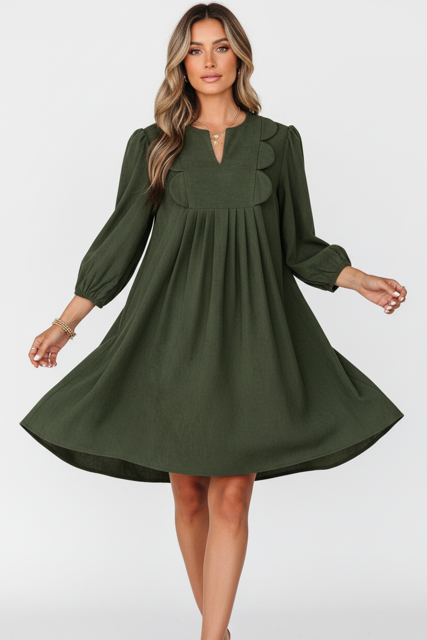  Robe mini velours côtelé plissé vert mousse manches bracelet détails festonnés - vue en mouvement montrant les plis créant un mouvement élégant fluide, drapé naturel de la jupe plissée, grâce et féminité du vêtement - BLACK-COAT