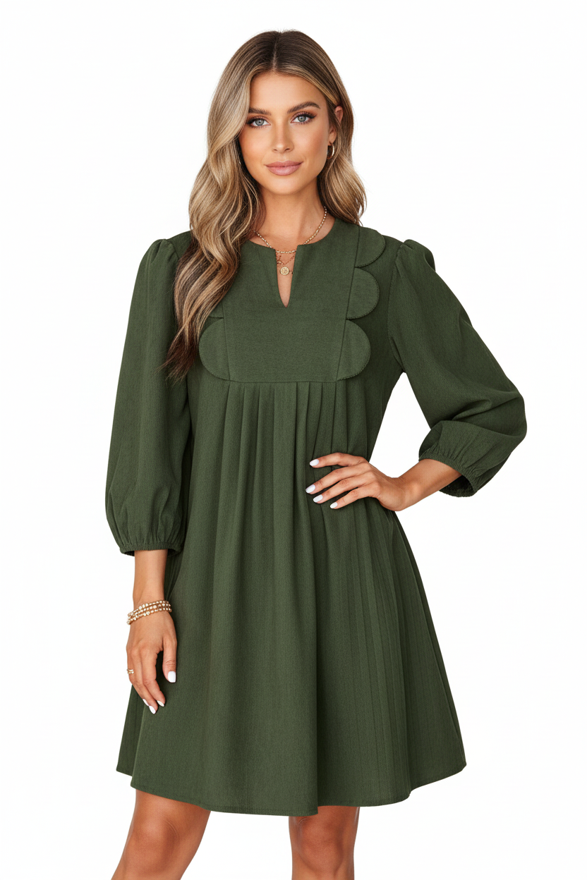 Robe mini velours côtelé plissé vert mousse manches bracelet détails festonnés - pose confiante main sur hanche montrant la silhouette féminine flatteuse, esthétique romantique vintage, élégance sophistiquée du vêtement - BLACK-COAT